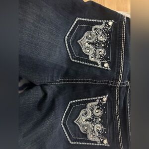 Flared jeans with design on the back